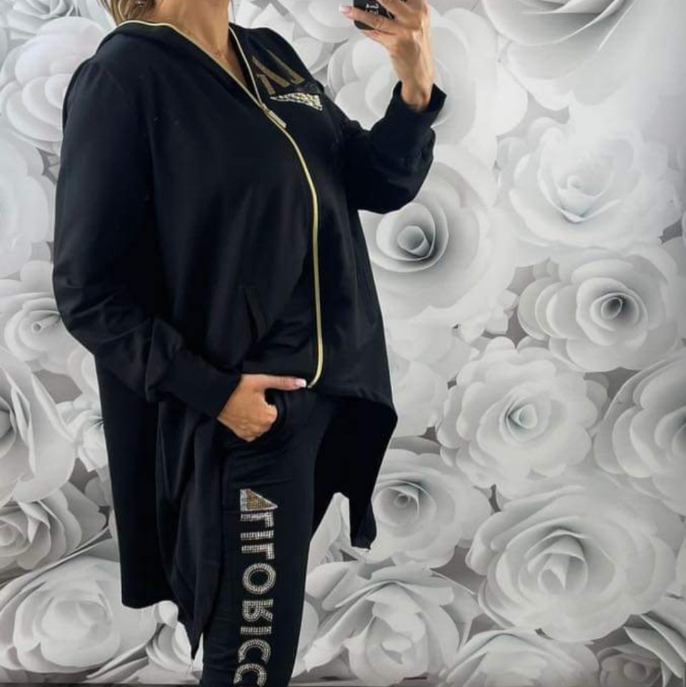 Women's black Lilo Ricco set consisting of an asymmetric sweatshirt and pants.